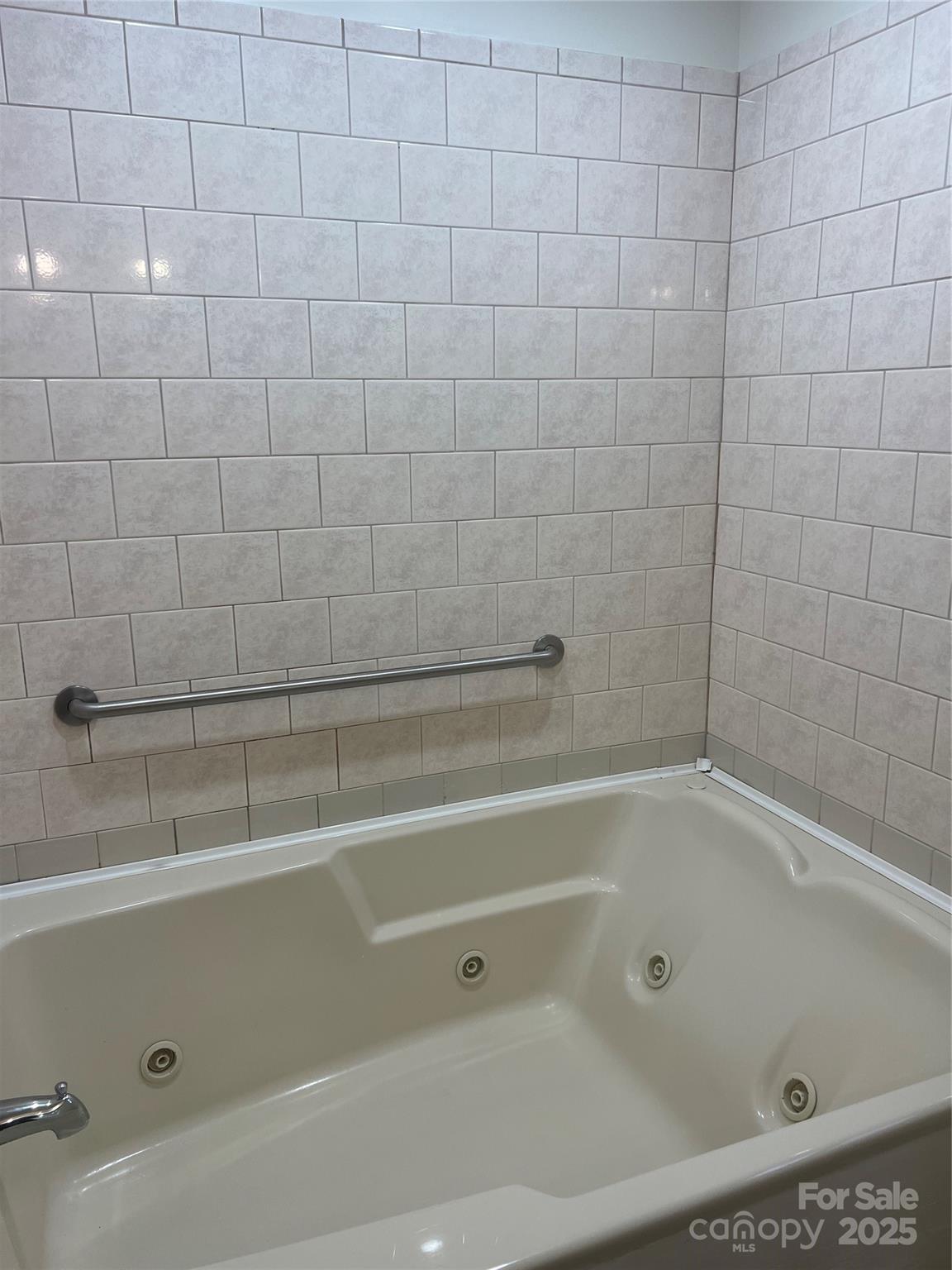 243 Governors View Road Asheville, NC 28805 - Photo 13 of 17 a bathroom with a shower and a bathtub