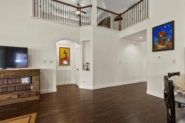 a kitchen with stainless steel appliances granite countertop a sink a stove top oven a counter space and cabinets