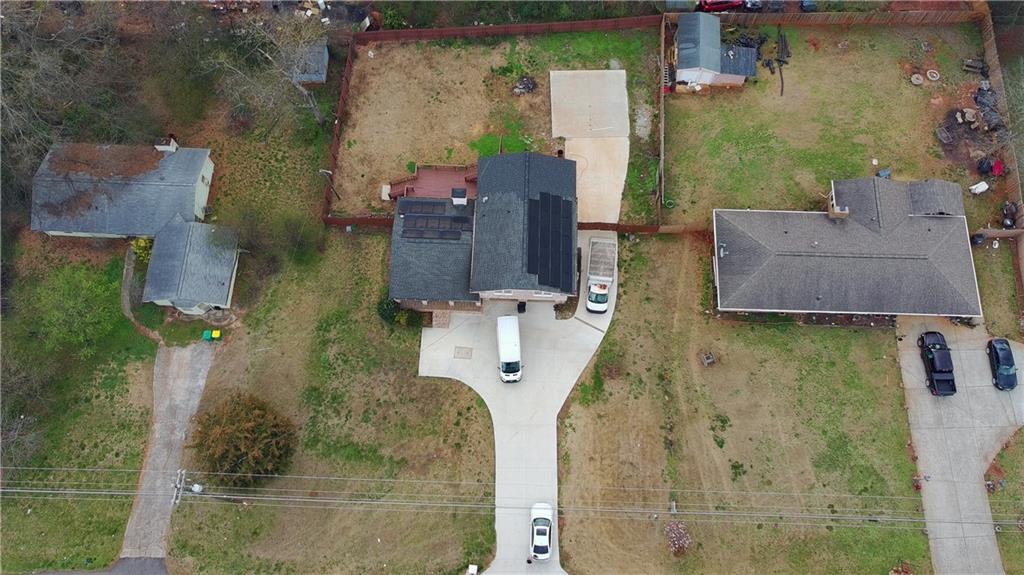 1292 Monfort Road Lawrenceville, GA 30046 - Photo 45 of 48 an aerial view of a house with outdoor space