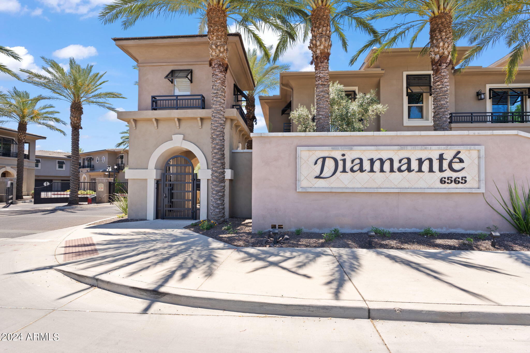 6565 East Thomas Road, Unit 1109 Scottsdale, AZ 85251 - Photo 2 of 40 a sign that is sitting on the side of a building