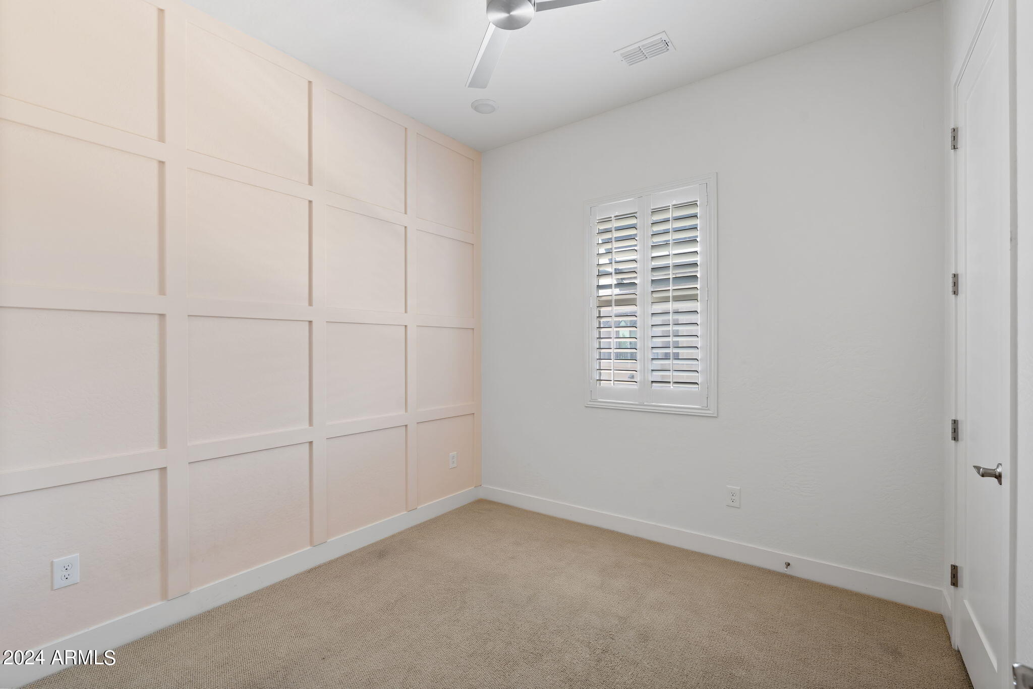 6565 East Thomas Road, Unit 1109 Scottsdale, AZ 85251 - Photo 28 of 40 an empty room with windows