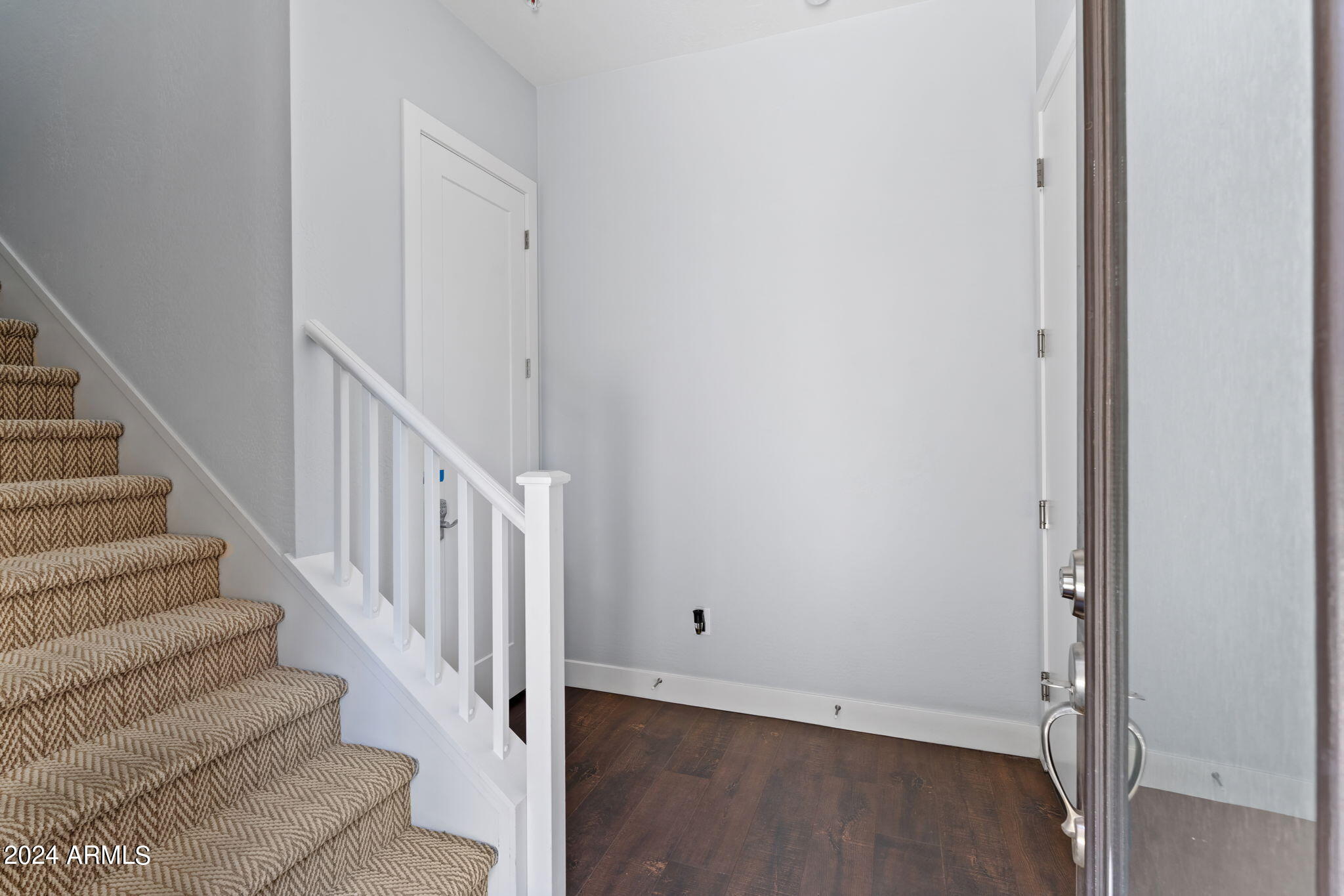6565 East Thomas Road, Unit 1109 Scottsdale, AZ 85251 - Photo 8 of 40 a view of entryway with wooden floor