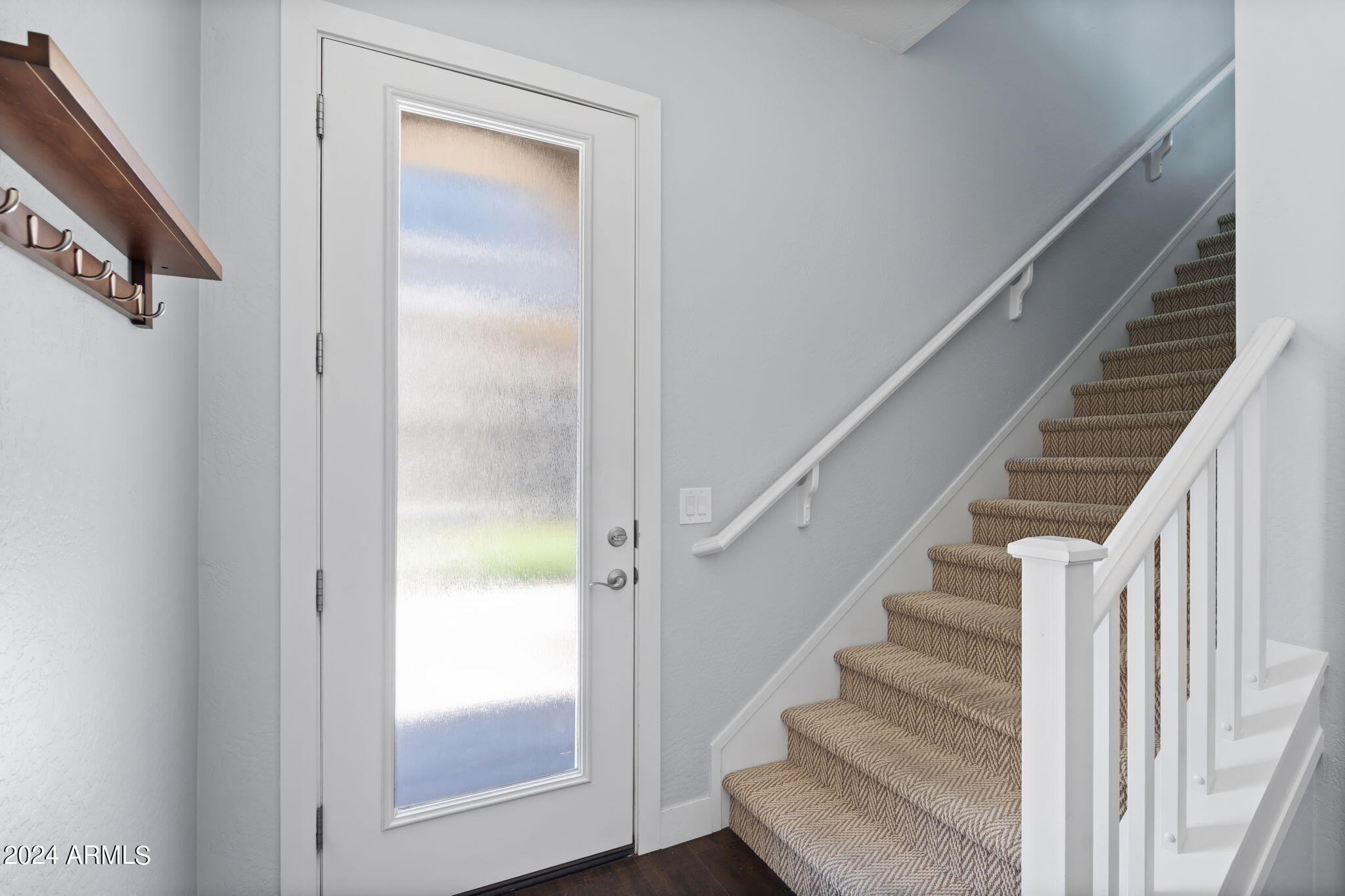 6565 East Thomas Road, Unit 1109 Scottsdale, AZ 85251 - Photo 9 of 40 a view of entryway with wooden floor