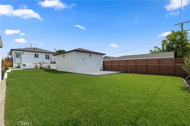 a view of a backyard with a garden