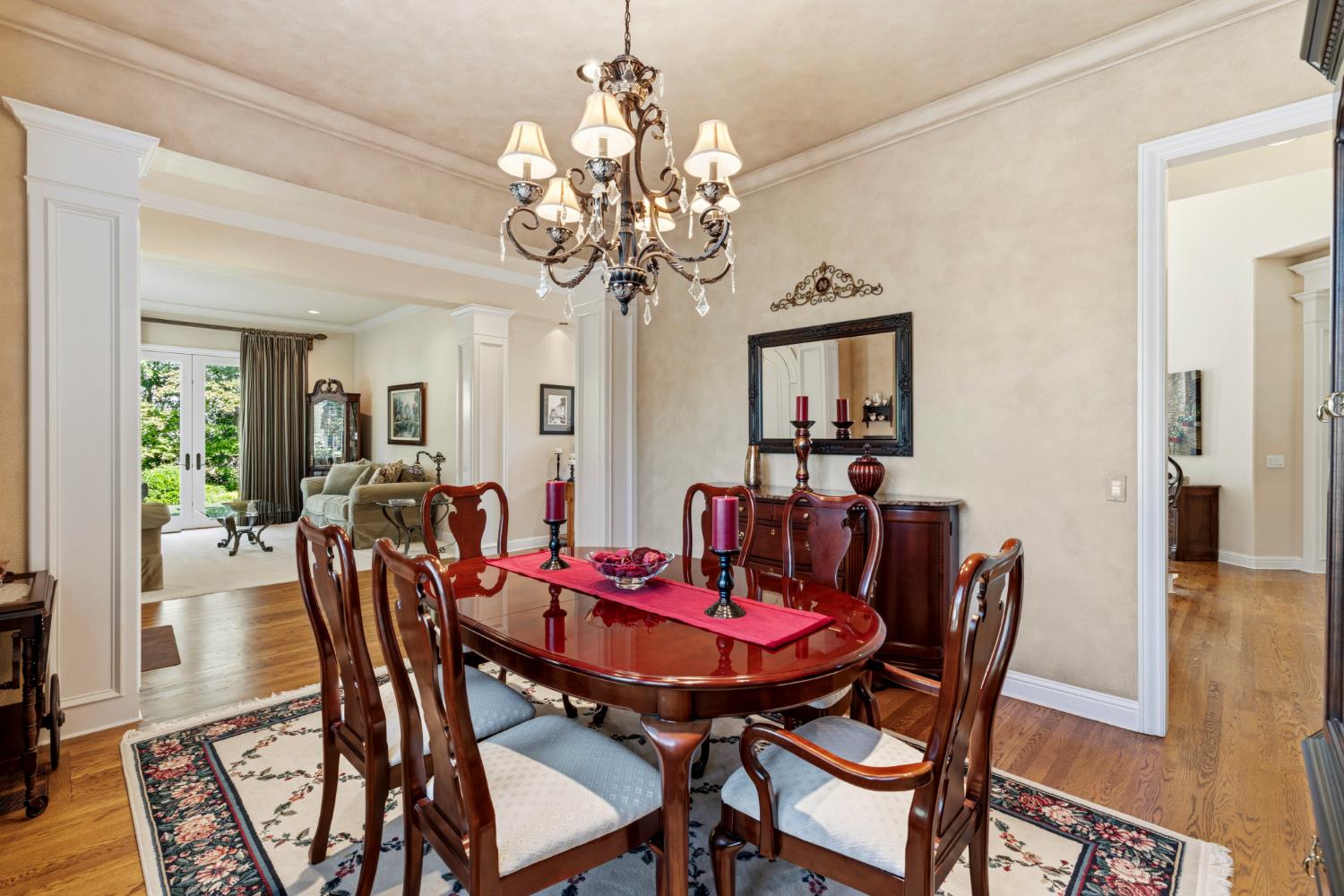5869 Granite Hills Drive South Granite Bay, CA 95746 - Photo 8 of 66 a view of a dining room with furniture wooden floor and chandelier