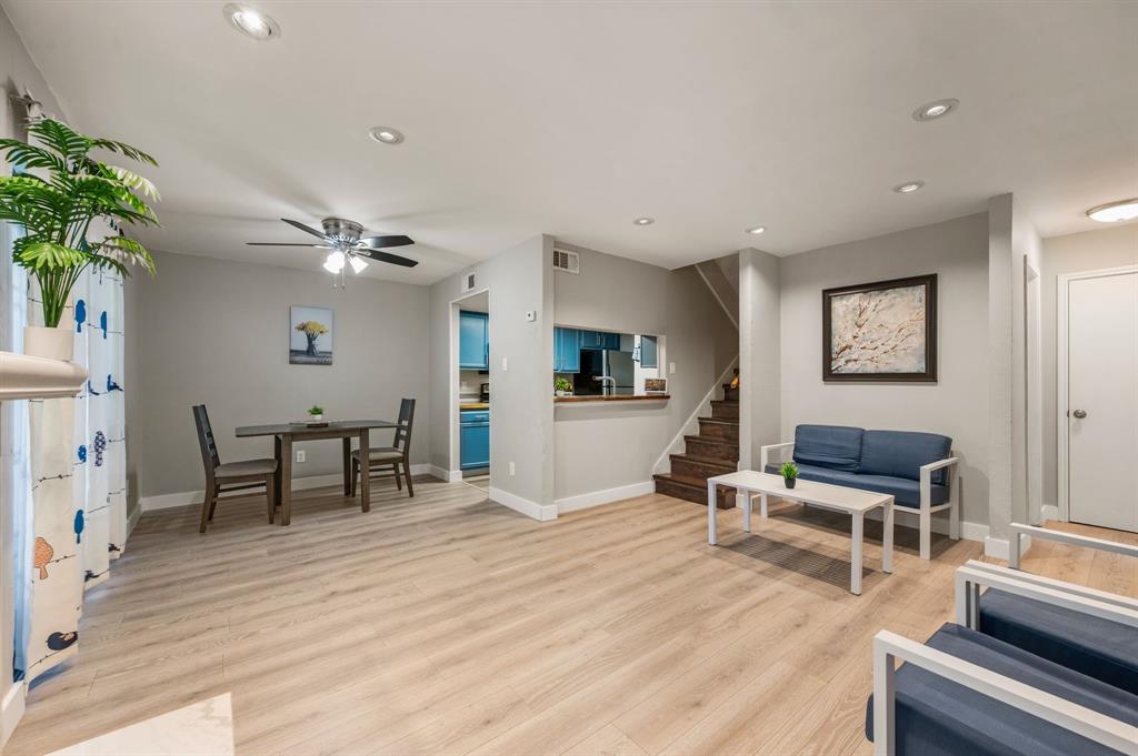 11311 Audelia Road, Unit 265 Dallas, TX 75243 - Photo 5 of 17 a living room with furniture and wooden floor