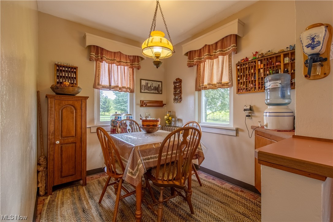 18752 Courtney Road Beloit, OH 44609 - Photo 14 of 23 Dining room with a wealth of natural light