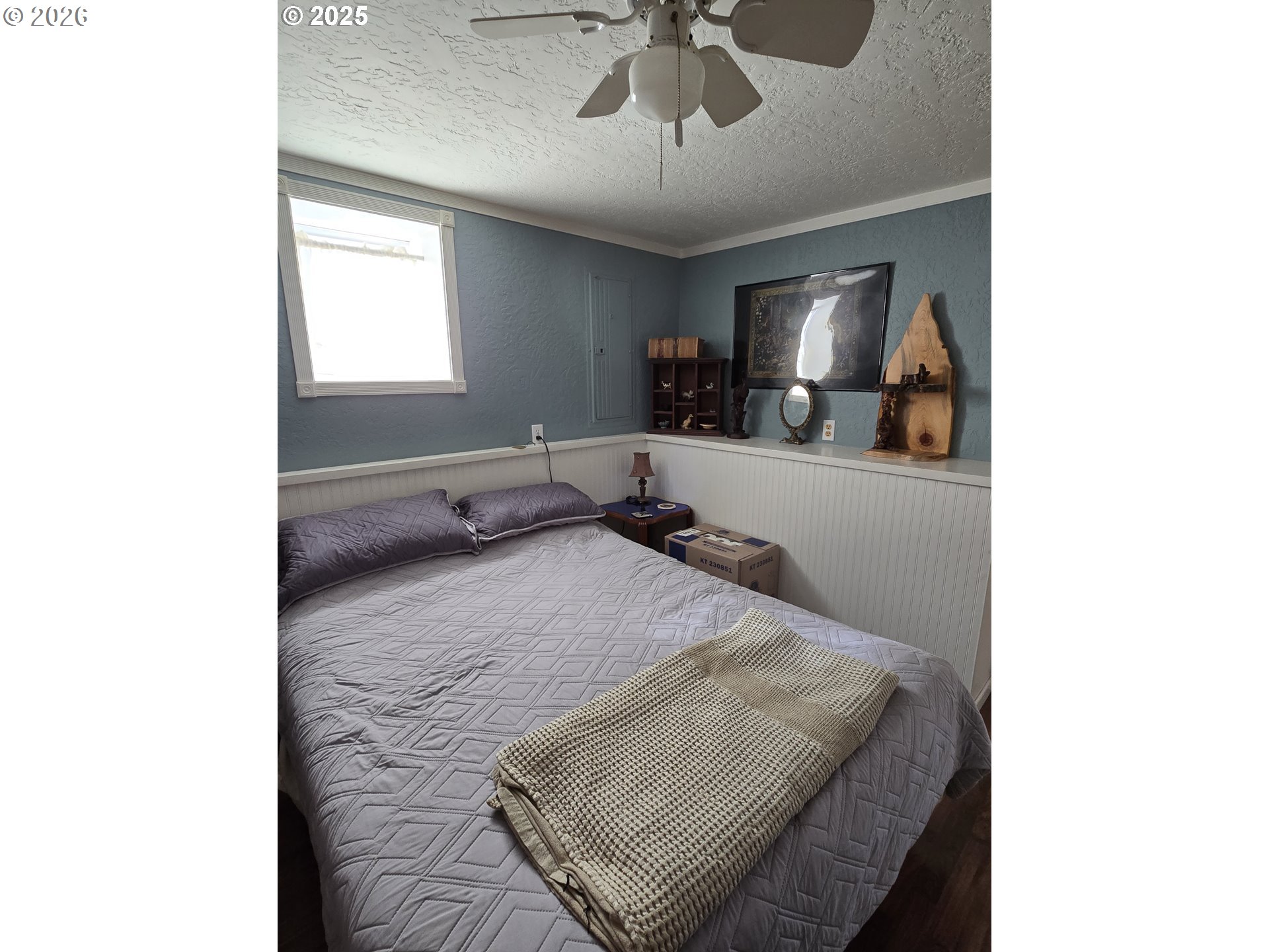206 1/2 South Main Street Union, OR 97883 - Photo 14 of 16 a living room with furniture and a chandelier