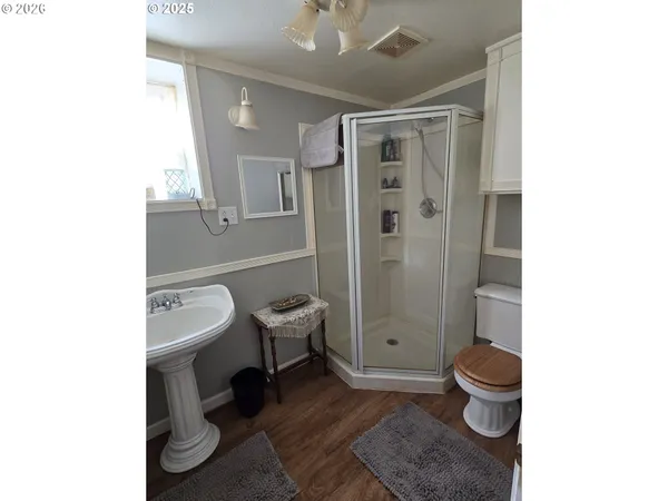 a kitchen with a sink cabinets and appliances