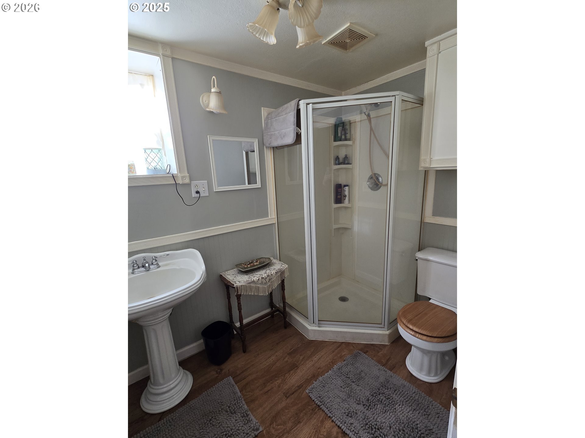 206 1/2 South Main Street Union, OR 97883 - Photo 15 of 16 a bathroom with a sink a toilet a shower and a mirror