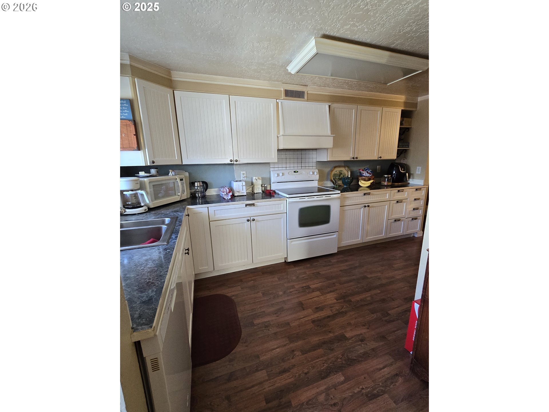 206 1/2 South Main Street Union, OR 97883 - Photo 16 of 16 a kitchen with a sink cabinets and appliances