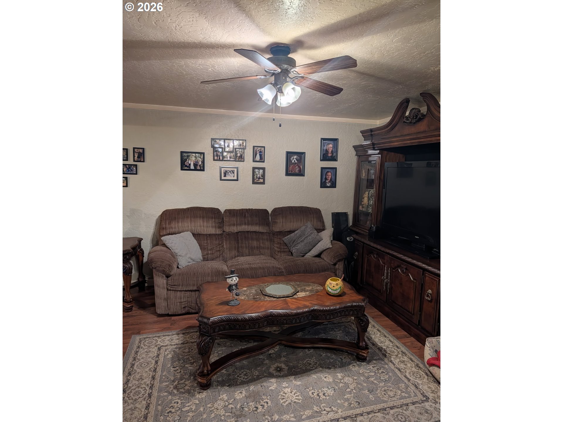206 1/2 South Main Street Union, OR 97883 - Photo 2 of 16 a living room with furniture and a ceiling fan