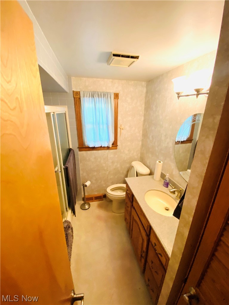 19119 West Middletown Road Beloit, OH 44609 - Photo 20 of 28 Bathroom with toilet, tile walls, and oversized vanity