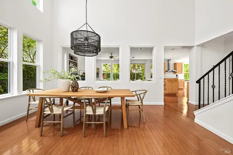 a dining room with furniture window wooden floor