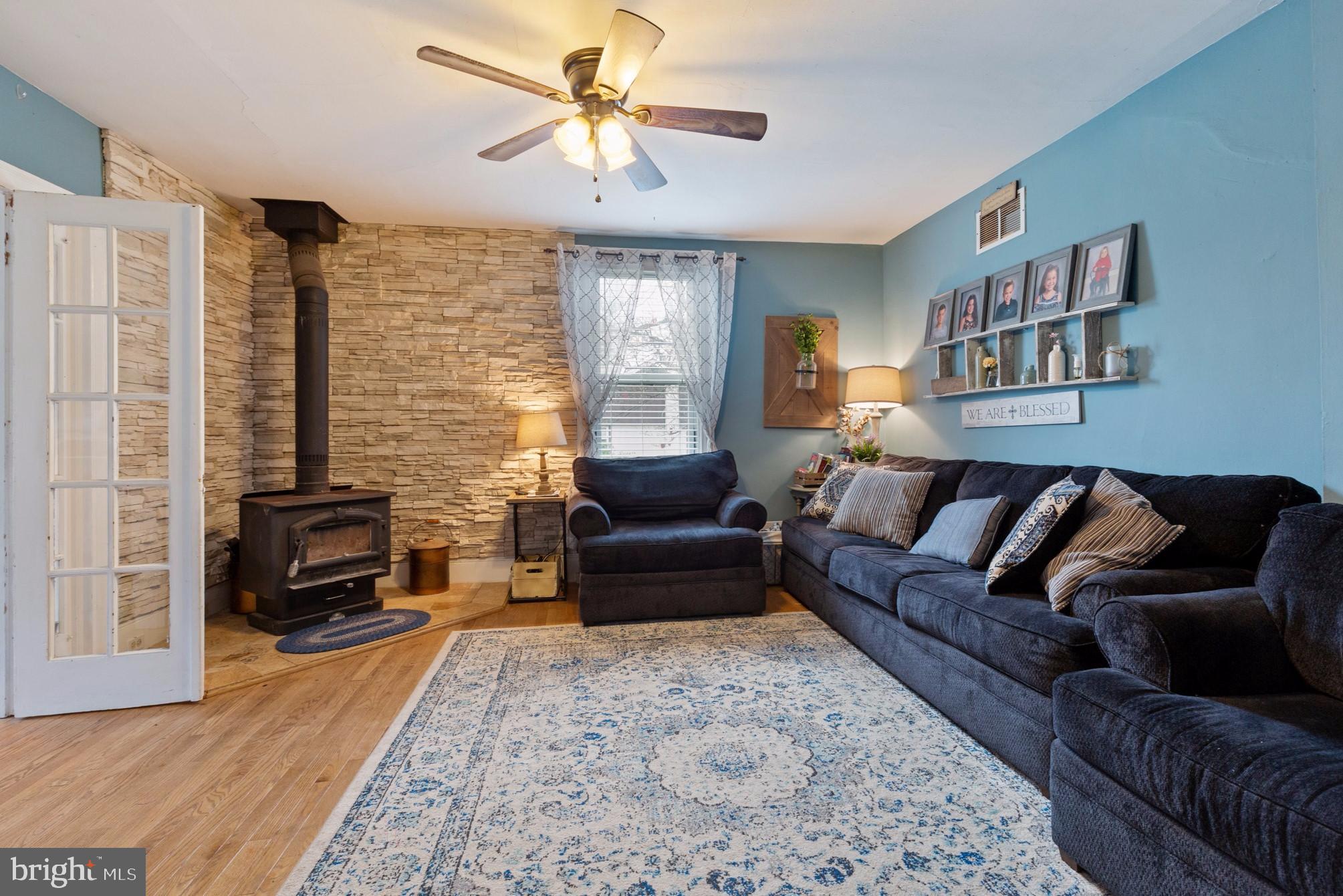 740 West Orvilla Road Hatfield, PA 19440 - Photo 9 of 21 Custom Stone Wall and Newer Wood Burning Fireplace