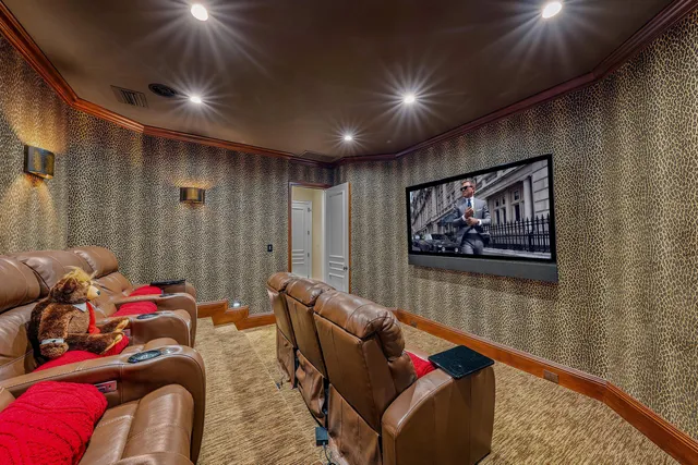 a bathroom with a granite countertop sink a mirror and shower