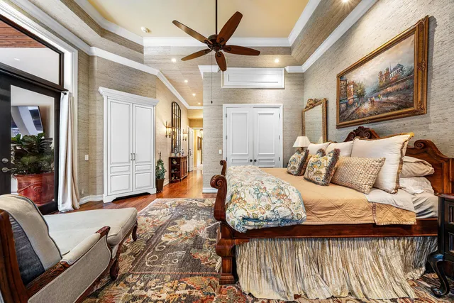 a bathroom with a granite countertop sink a mirror a and a shower