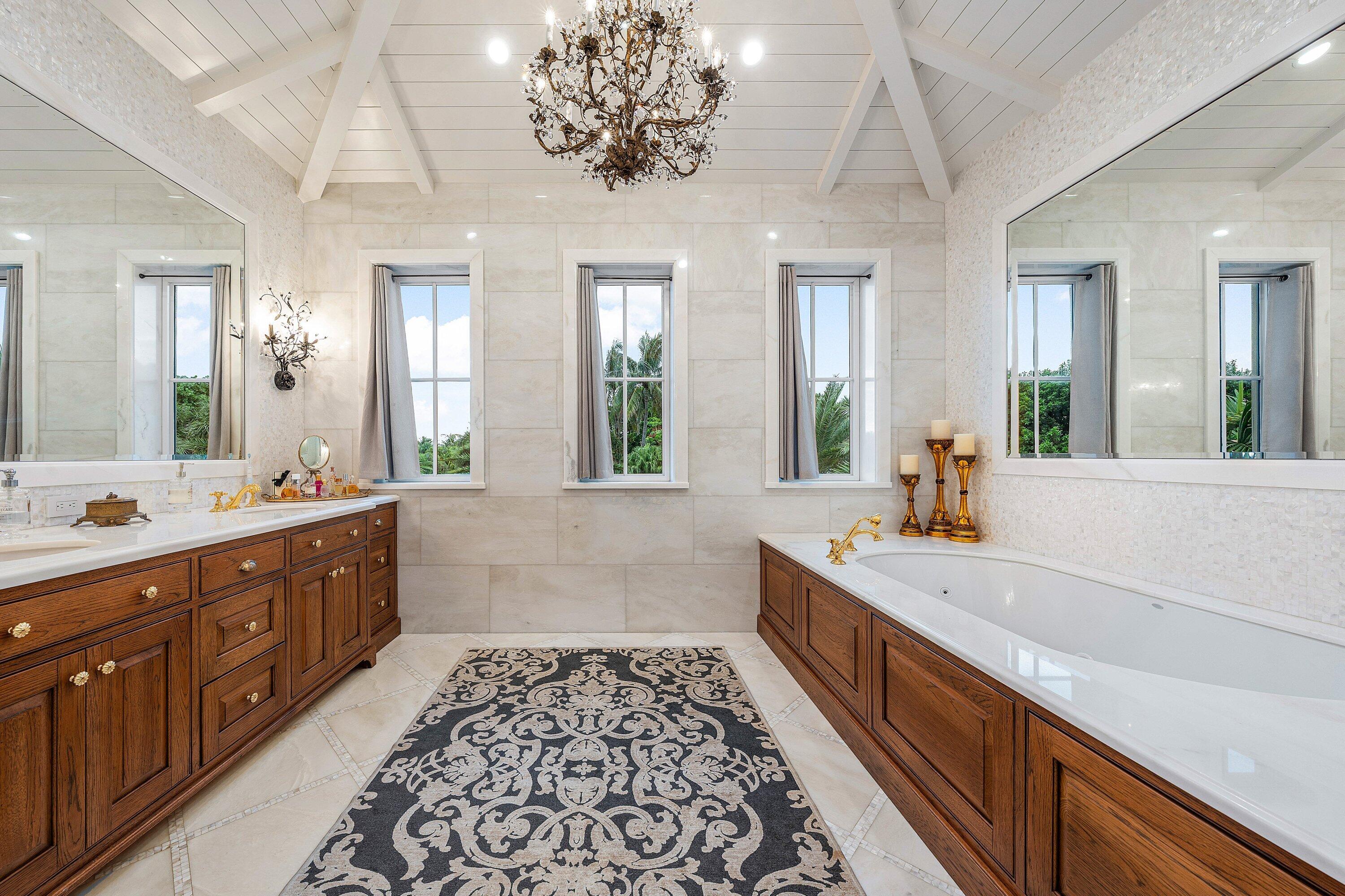 518 Harbor Court Delray Beach, FL 33483 - Photo 37 of 83 a large bathroom with a double vanity sink large mirror and