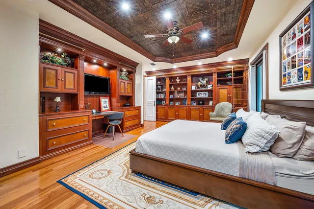 a view of swimming pool with outdoor seating and plants