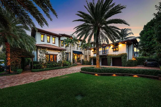 a view of a building with a backyard