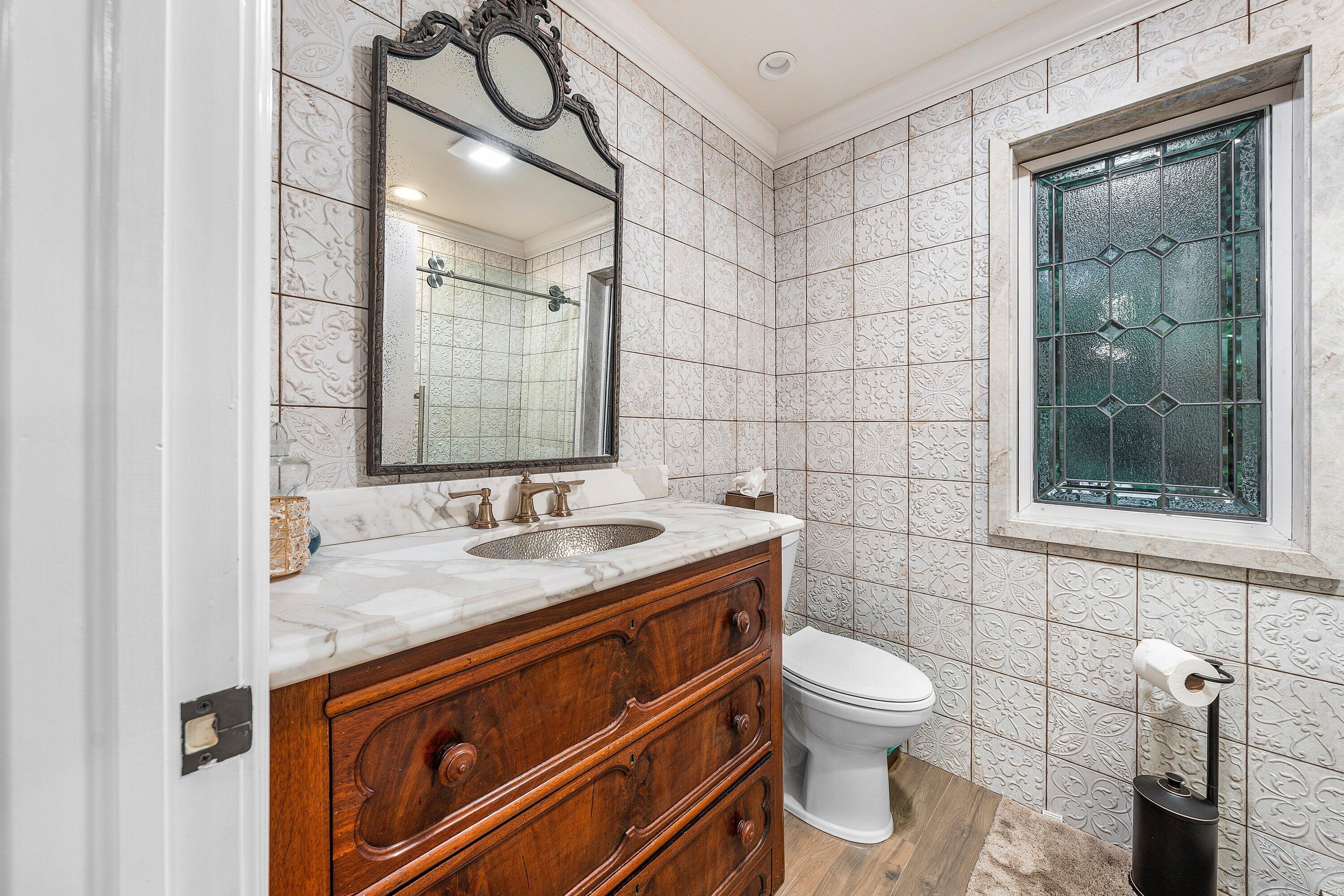 518 Harbor Court Delray Beach, FL 33483 - Photo 57 of 83 a bathroom with a granite countertop sink toilet and shower