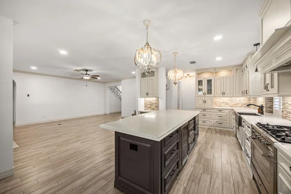 a view of cabinets and wooden floor