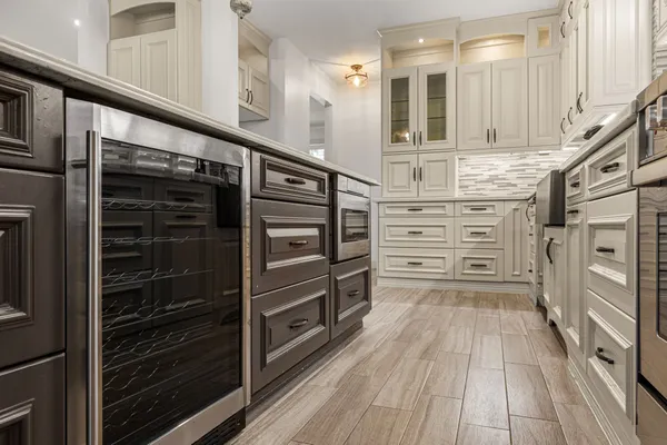 a view of hallway with wooden floor and stairs