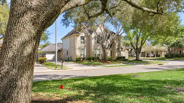 a view of a street in front of a building