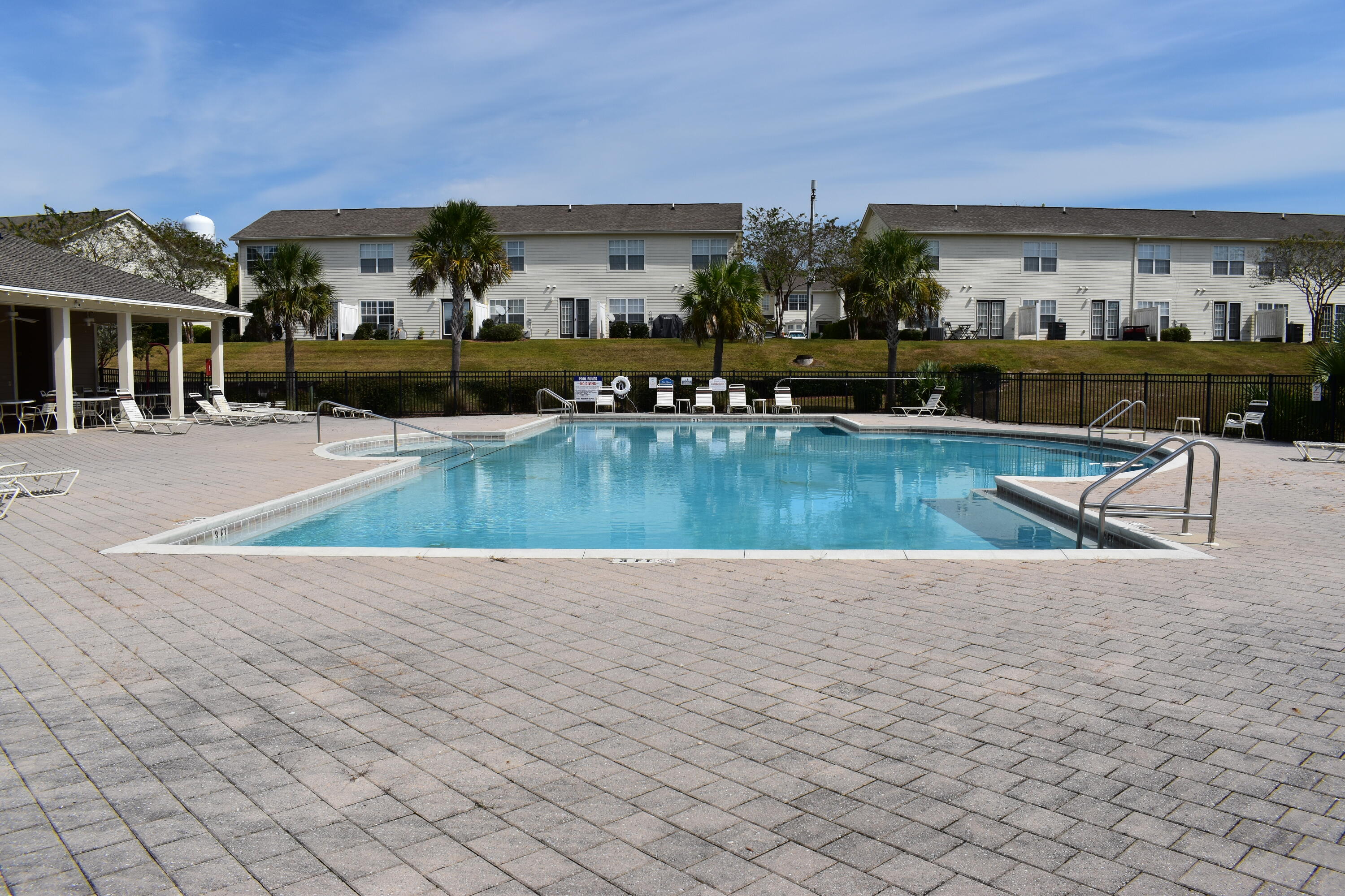 535 Wingspan Way Crestview, FL 32536 - Photo 18 of 20 a view of a swimming pool with an outdoor seating