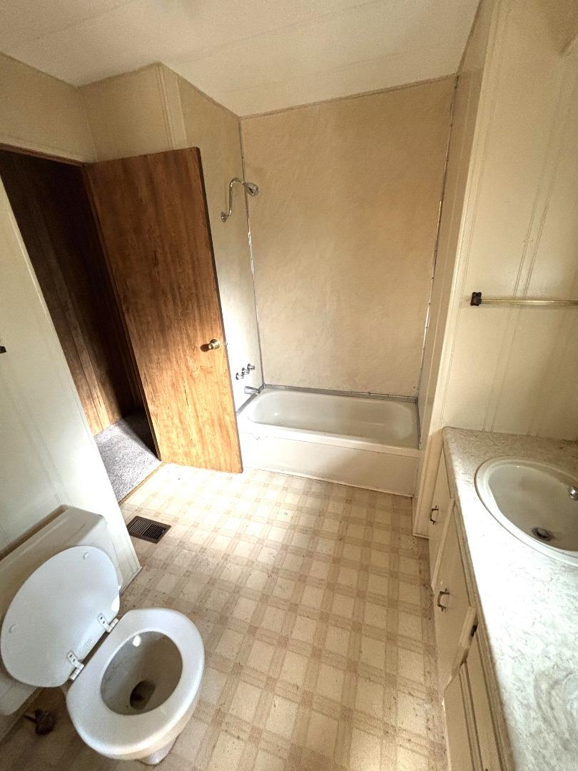 3156 Esplanade, Unit 304 Chico, CA 95973 - Photo 21 of 30 a bathroom with a sink and a mirror