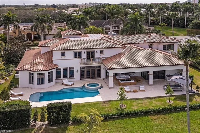 a view of entryway and hall with a front door