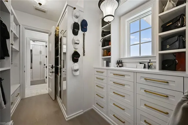 a bathroom with a shower and a sink