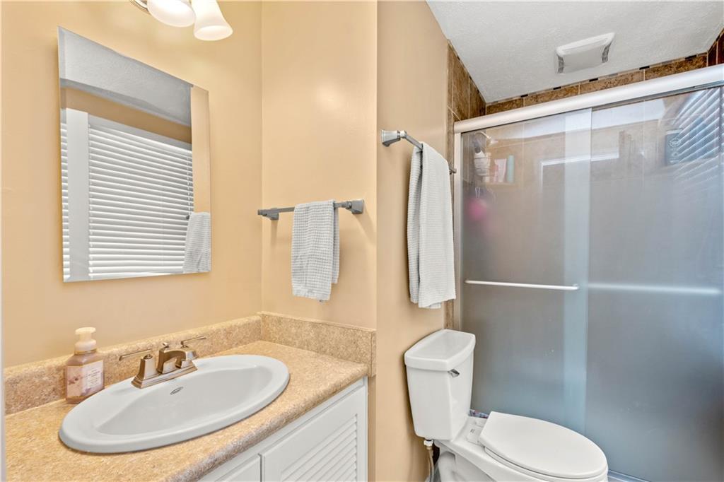 2143 Pendleton Drive Monroeville, PA 15146 - Photo 12 of 25 a bathroom with a sink toilet and shower