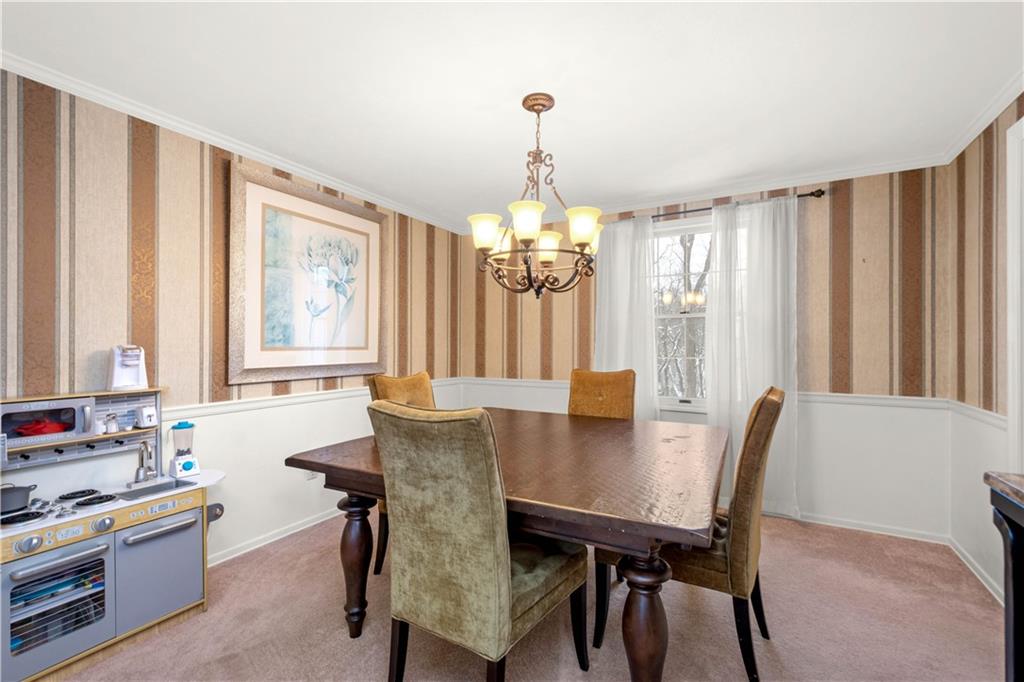 2143 Pendleton Drive Monroeville, PA 15146 - Photo 4 of 25 a view of a dining room with furniture and window