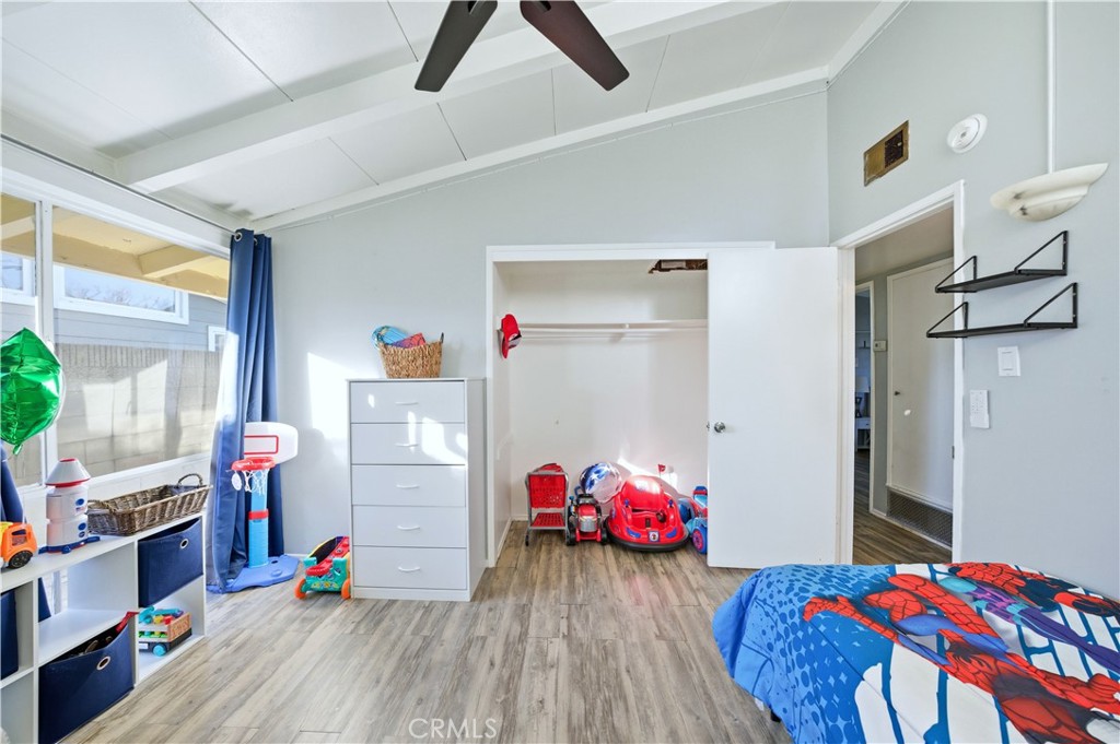 10909 1st Whittier, CA 90603 - Photo 15 of 30 a bedroom with bed and a wooden floor