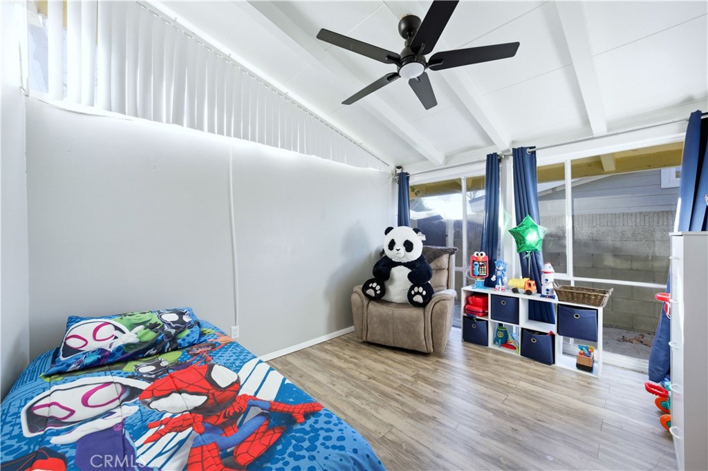 10909 1st Whittier, CA 90603 - Photo 16 of 30 a bedroom with furniture and a wooden floor