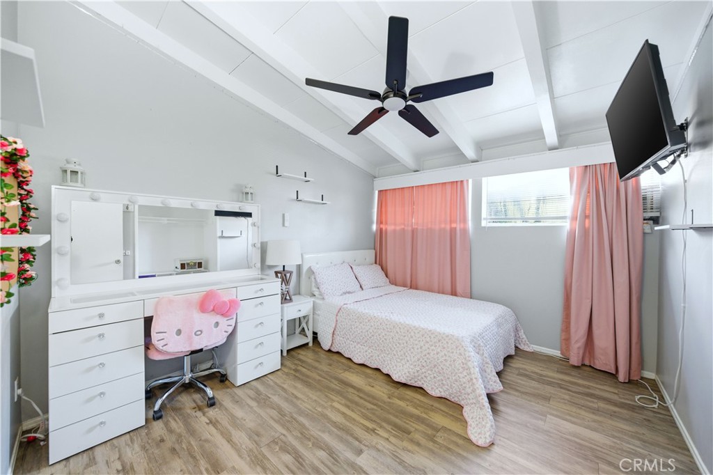 10909 1st Whittier, CA 90603 - Photo 18 of 30 a bedroom with a bed and a flat screen tv