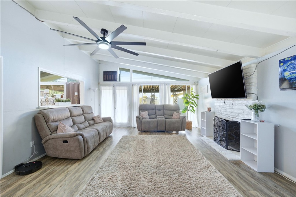 10909 1st Whittier, CA 90603 - Photo 5 of 30 a living room with furniture and a flat screen tv