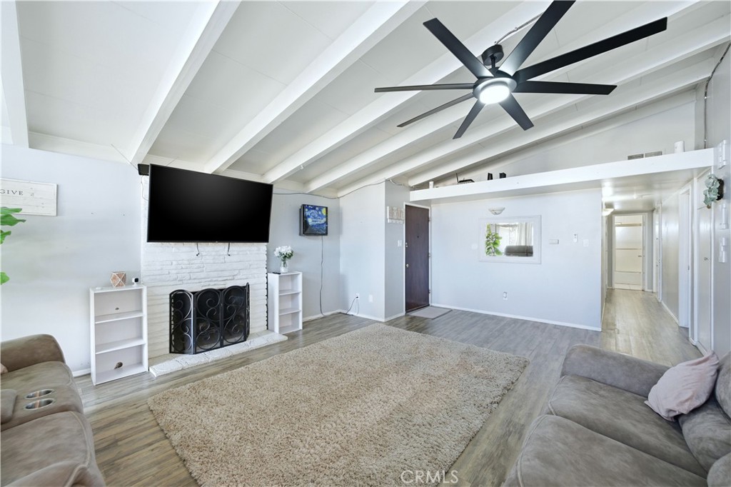 10909 1st Whittier, CA 90603 - Photo 6 of 30 a view of a livingroom with furniture and a fireplace