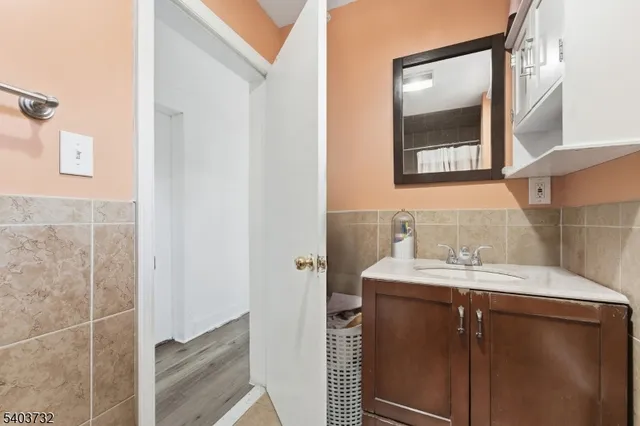 a bathroom with a shower and toilet