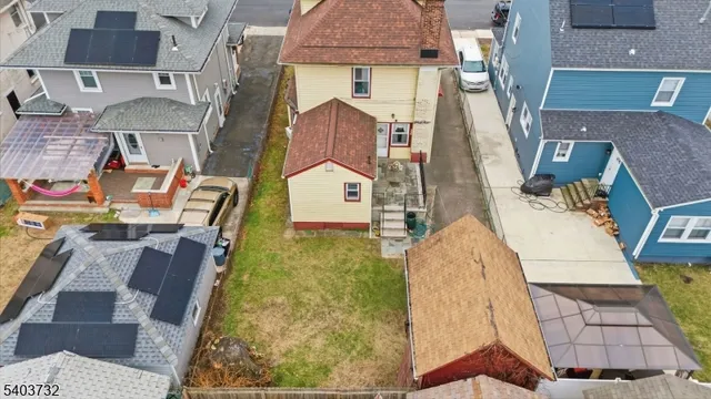 an aerial view of a house with swimming pool