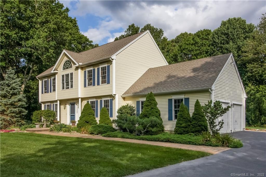 156 Cow Hill Road Clinton, CT 06413 - Photo 1 of 1 a front view of a house with a yard