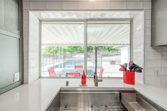 a view of a dining room kitchen and a window
