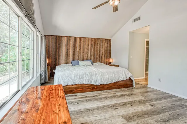 a kitchen with a sink and refrigerator