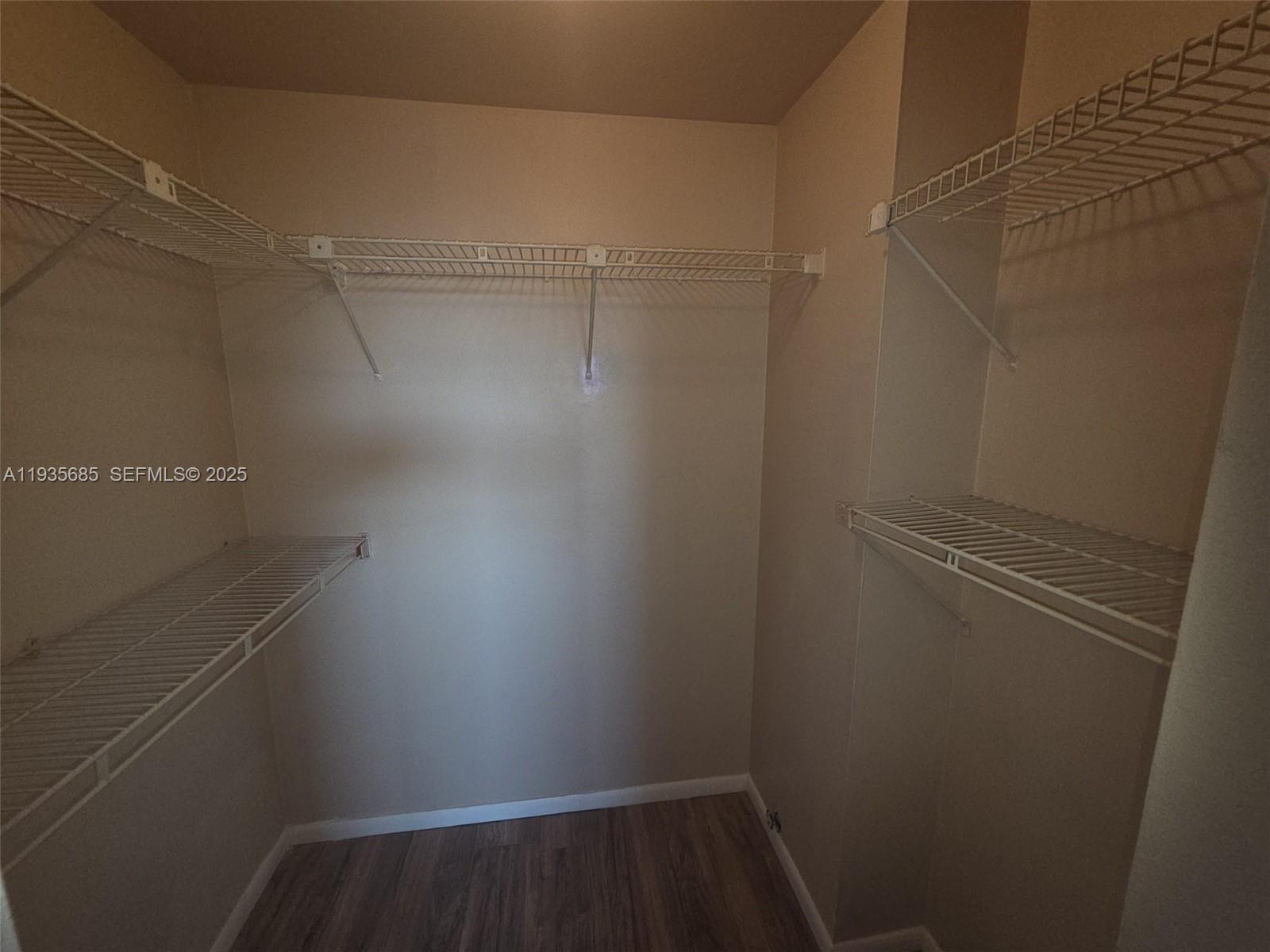 8020 North Colony Circle, Unit 305 Tamarac, FL 33321 - Photo 12 of 19 a view of small space with racks on the wall