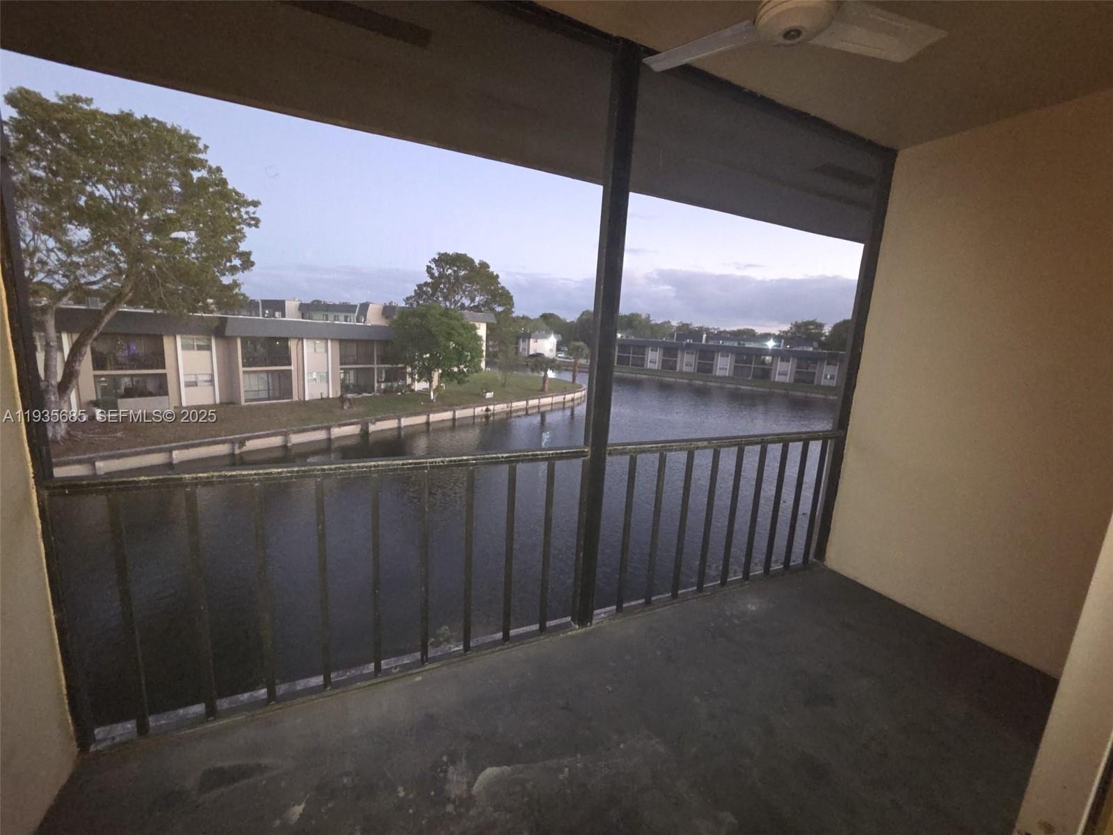 8020 North Colony Circle, Unit 305 Tamarac, FL 33321 - Photo 18 of 19 a view of a house with a balcony