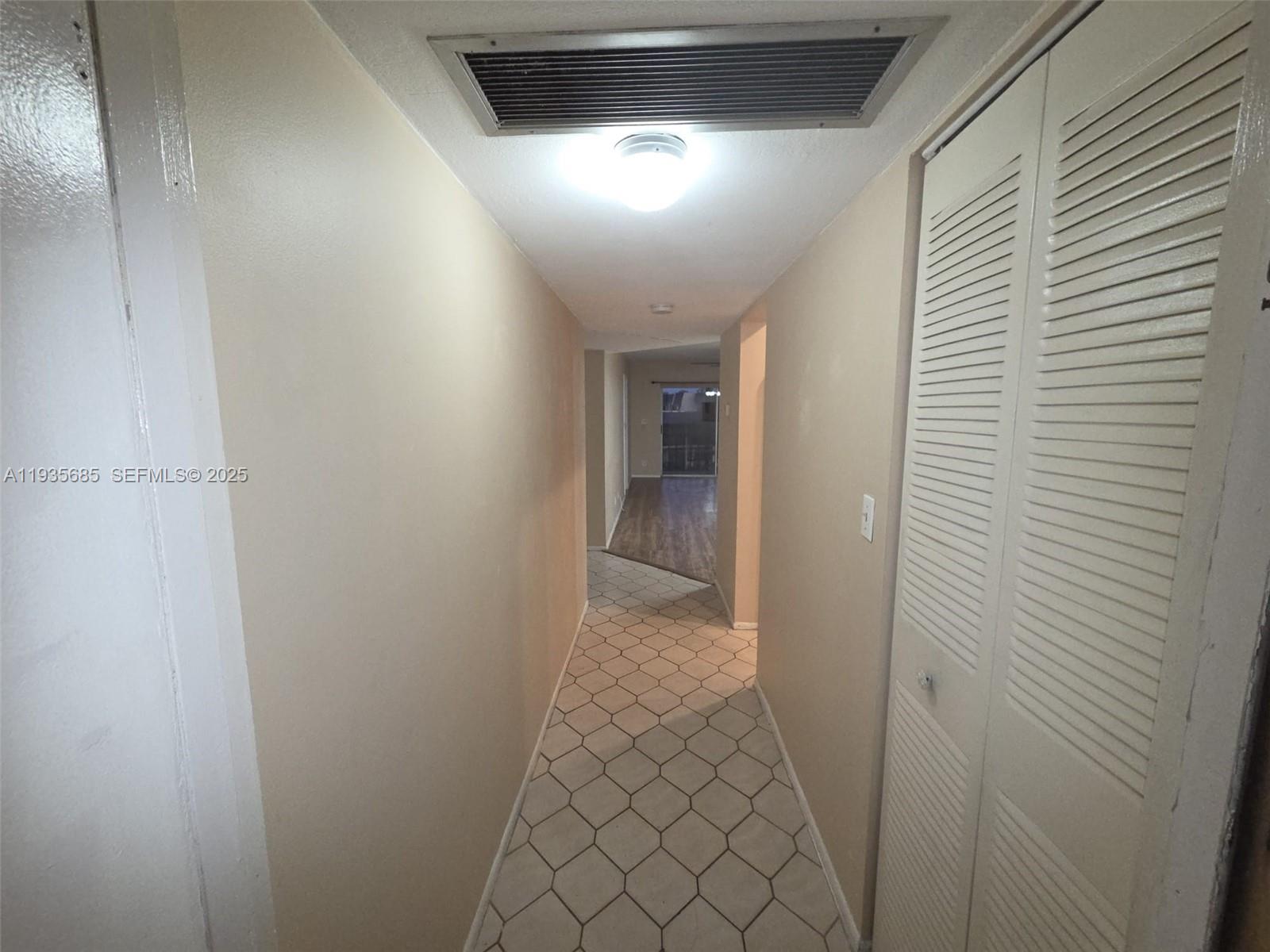 8020 North Colony Circle, Unit 305 Tamarac, FL 33321 - Photo 2 of 19 a view of hallway