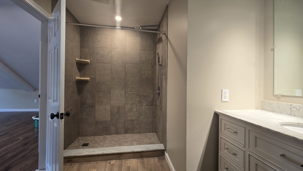 15 Central Street, Unit 4 Georgetown, MA 01833 - Photo 19 of 24 a bathroom with a shower and a sink