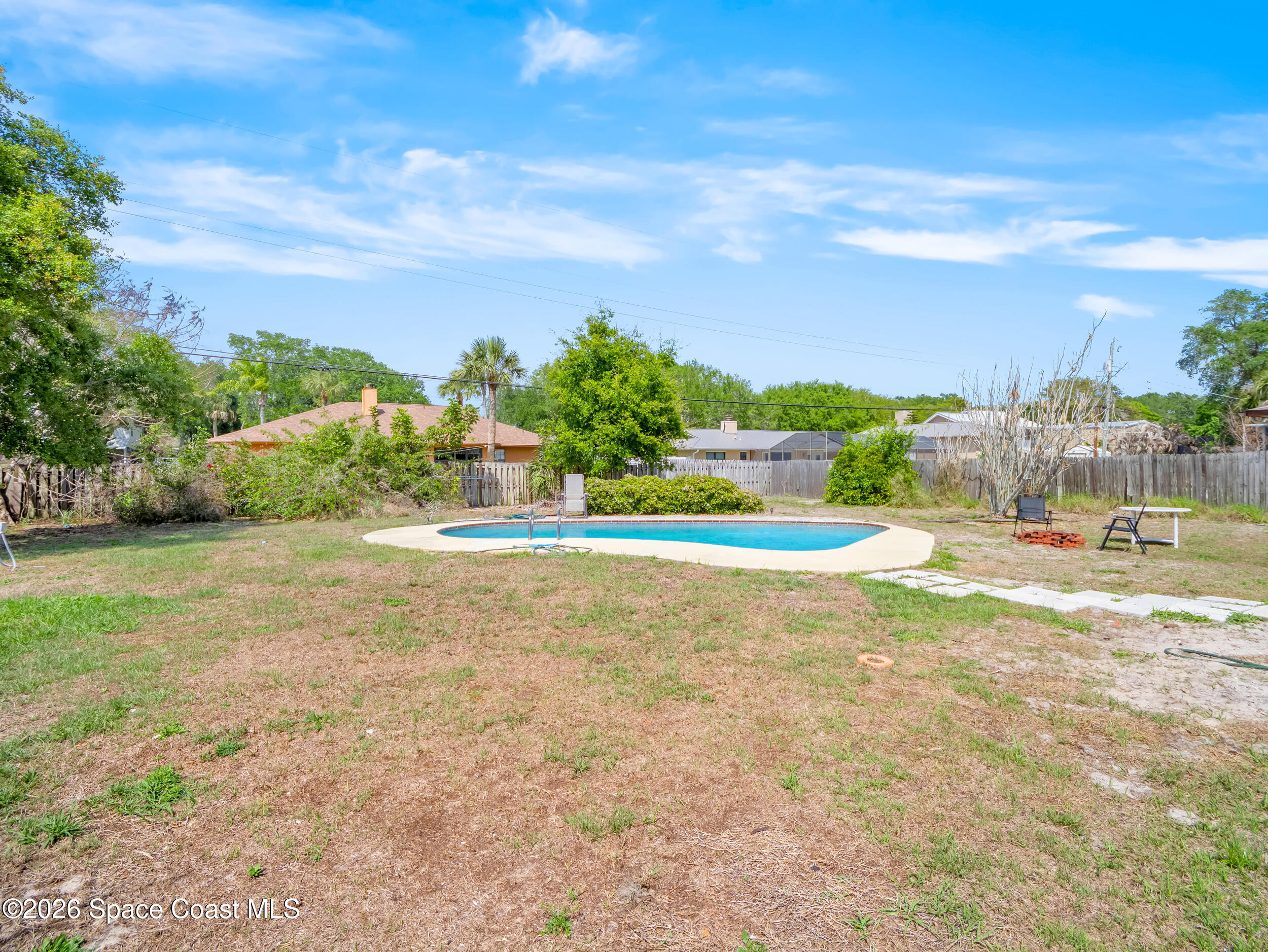 1190 Shady Lane Merritt Island, FL 32952 - Photo 21 of 35 a view of a house with a yard