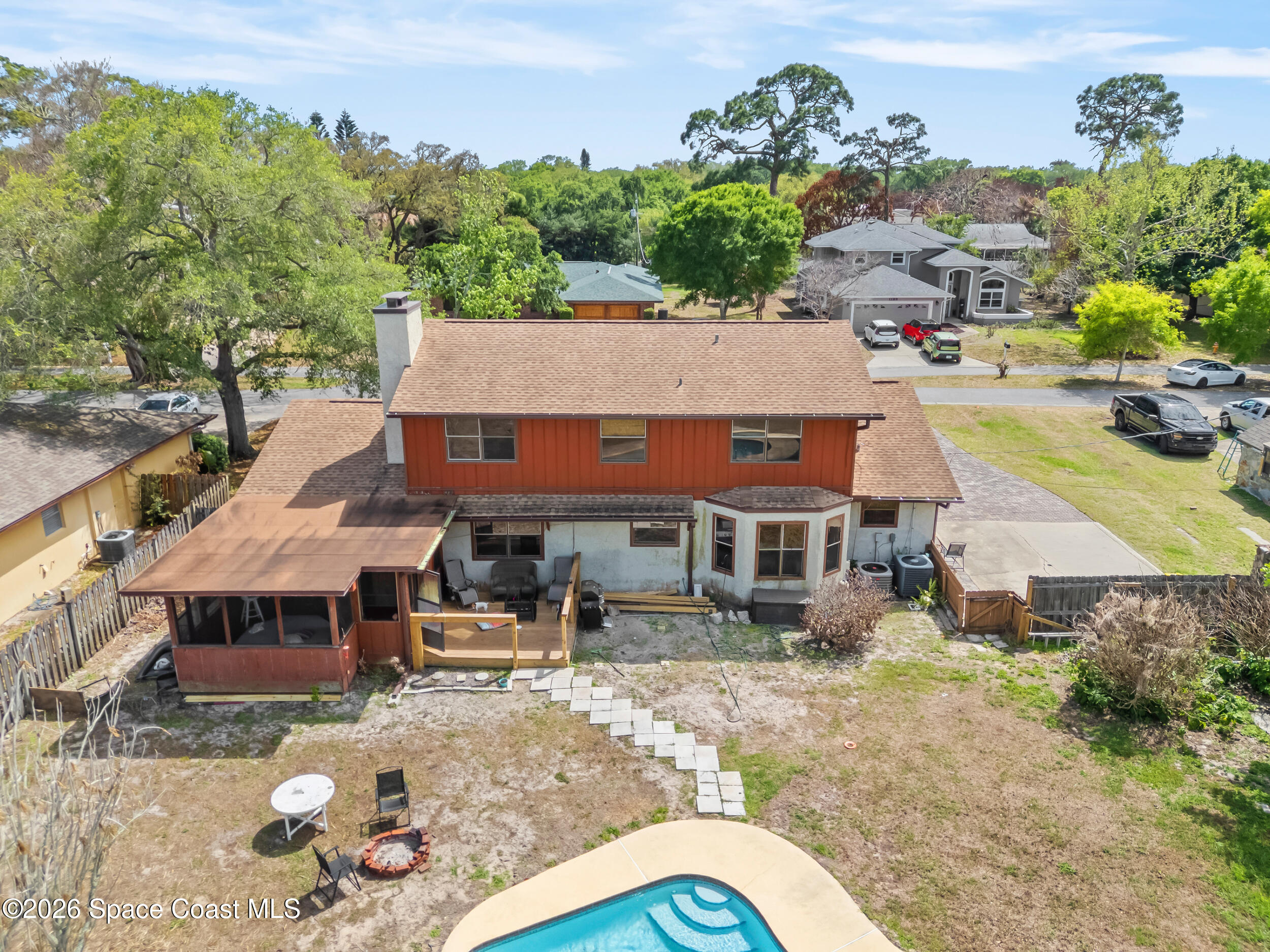 1190 Shady Lane Merritt Island, FL 32952 - Photo 30 of 35 an aerial view of a house with yard swimming pool and outdoor seating
